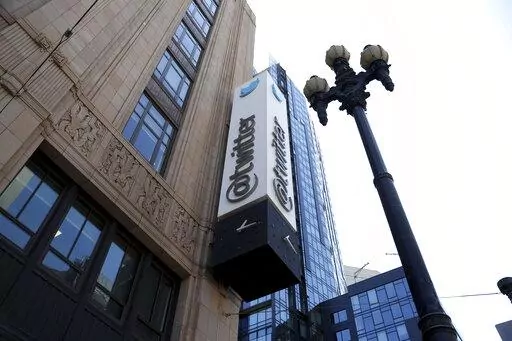 A sign is pictured outside the Twitter headquarters in San Francisco, Monday, April 25, 2022. Elon Musk reached an agreement to buy Twitter for roughly $44 billion on Monday, promising a more lenient touch to policing content on the platform where he promotes his interests, attacks critics and opines on social and economic issues to more than 83 million followers. (AP Photo/Jed Jacobsohn)