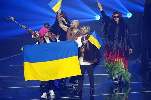 Kalush Orchestra from Ukraine arrives for the Grand Final of the Eurovision Song Contest at Palaolimpico arena, in Turin, Italy, Saturday, May 14, 2022. (AP Photo/Luca Bruno)