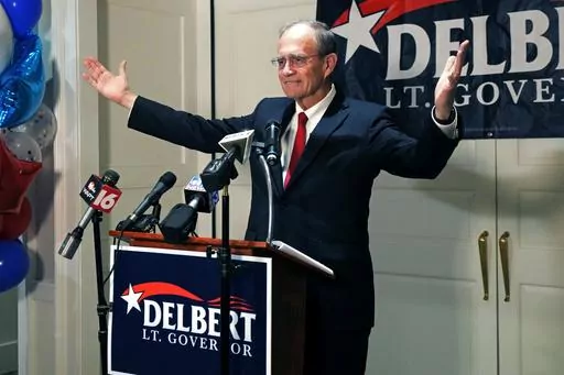 Mississippi Republican Lt. Gov. Delbert Hosemann raises his arms in victory as he addresses supporters in Jackson, Miss., after winning the party primary Tuesday, Aug. 8, 2023. Hosemann defeated two challengers in his reelection bid for the party nomination. (AP Photo/Rogelio V. Solis)