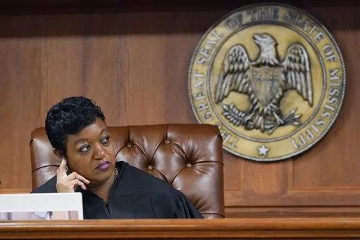 Hinds County Chancery Judge Crystal Wise Martin listens as lawyer Rob McDuff, attorney for Parents For Public Schools, presents arguments in a lawsuit that says the state violates its own constitution with a grant program for private schools, during a hearing in Jackson, Miss., Aug. 23, 2022. Judge Martin on Thursday, Oct. 13, 2022, blocked a state law that put $10 million of federal pandemic relief money into infrastructure grants for private schools. (AP Photo/Rogelio V. Solis, File)