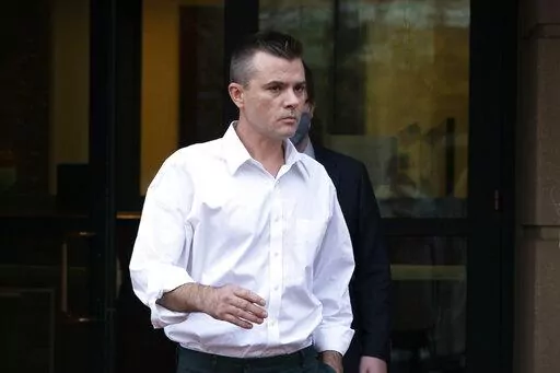 Igor Danchenko leaves the Albert V. Bryan United States Courthouse in Alexandria, Va., Nov. 4, 2021. Danchenko, a think tank analyst who played a major role in the creation of a flawed report about former President Donald Trump, is scheduled to go on trial Tuesday, Oct. 11, 2022, for lying to the FBI about how he developed information that went into what is now infamously known as the “Steele dossier.” (AP Photo/Manuel Balce Ceneta, File)