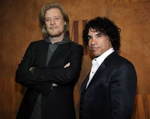 Daryl Hall, left, and John Oates, recipients of BMI Icons awards, pose together before the 56th annual BMI Pop Awards in Beverly Hills, Calif., on May 20, 2008. Hall has sued his longtime music partner John Oates, arguing that his plan to sell off his share of a joint venture would violate a business agreement the duo had.(AP Photo/Chris Pizzello, File)