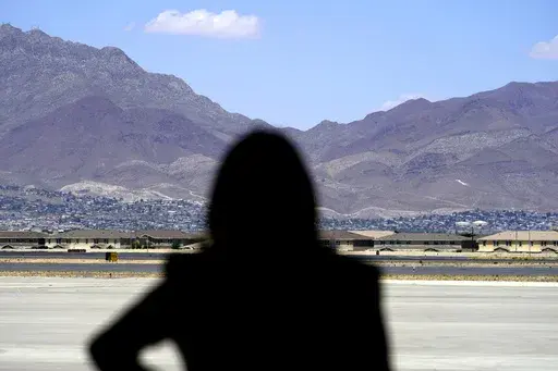 Vice President Kamala Harris stands in front of mountains during a news conference, June 25, 2021, at the airport after her tour of the U.S. Customs and Border Protection Central Processing Center in El Paso, Texas. (AP Photo/Jacquelyn Martin, File)