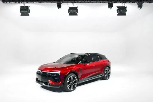 The 2024 Chevrolet SS EV is shown in Warren, Mich., July 12, 2022. The surprise deal by Senate Democrats on a pared-down bill to support families, boost infrastructure and fight climate change is likely to jump start sales of electric vehicles. (AP Photo/Paul Sancya, File)
