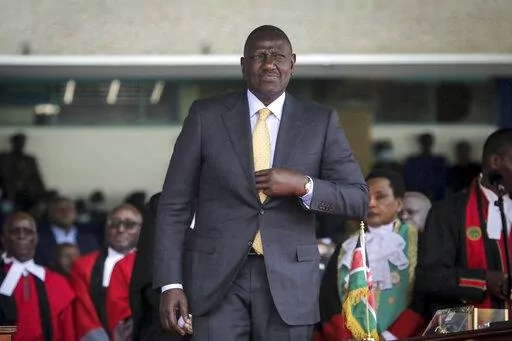 Kenya's new president William Ruto arrives to be sworn in to office at a ceremony held at Kasarani stadium in Nairobi, Kenya Tuesday, Sept. 13, 2022. Ruto said that climate change will be key to the government's agenda and made an ambitious pledge to ramp up clean energy and phase out fossil fuels for electricity by 2030. (AP Photo/Brian Inganga, File)