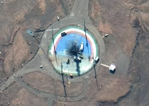 In this satellite photo from Maxar Technologies, trucks and other equipment surround a scorched launch pad at Iran's Imam Khomeini Spaceport in rural Semnan province Sunday, Feb. 27, 2022. Iran likely suffered another failed launch of a satellite-carrying rocket in recent days, attempting to reinvigorate a program criticized by the West even as Tehran faces last-minute negotiations with world powers to save its tattered nuclear deal in Vienna. (Satellite image ©2022 Maxar Technologies via AP)