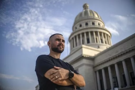 Elian González poses for a portrait in front of the Capitolio in Havana, Cuba, Thursday, June 27, 2023. Twenty three years after González became the center of a dramatic diplomatic custody battle between Cuba and the United States, the young Cuban is now headed to his country’s congress with hopes of representing his people at a time of record migration and heightened tension between the two seaside neighbors. (AP Photo/Ramon Espinosa)