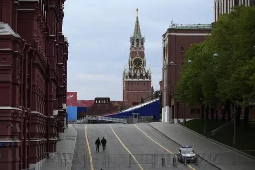 A view of the Red Square closed for Victory Parade preparation, with the Spasskaya Tower in the center, in Moscow, Russia, Wednesday, May 3, 2023. Russian authorities have accused Ukraine of attempting to attack the Kremlin with two drones overnight. The Kremlin on Wednesday decried the alleged attack attempt as a "terrorist act" and said Russian military and security forces disabled the drones before they could strike. (AP Photo/Alexander Zemlianichenko)