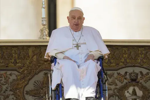 Pope Francis arrives at the end of a mass in St. Peter's Square at The Vatican, Sunday, April 6, 2025, part of the jubilee of the sick and the health workers. (AP Photo/Andrew Medichini)