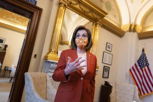 Speaker of the House Nancy Pelosi, D-Calif., talks to The Associated Press about the impact of the Jan. 6 attack by a mob loyal to then-President Donald Trump, during a tour of her office on Capitol Hill in Washington, Wednesday, Jan. 5, 2022.  On Friday, July 29, 2022, The Associated Press reported on stories circulating online incorrectly claiming Freedom of Information Act requests show a dozen phone calls between Ray Epps’ cell phone and Pelosi’s office a week before the Capitol insurrec