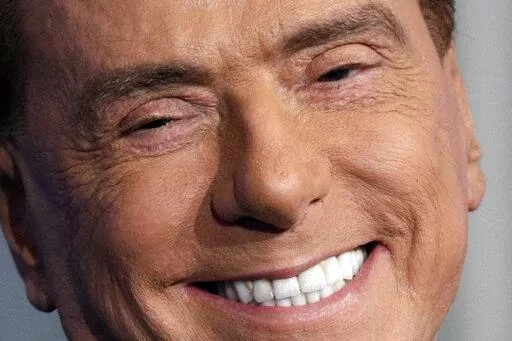 Italian former Premier and Forza Italia (Go Italy) party leader, Silvio Berlusconi, smiles during the recording of the Italian state television RAI, Porta a Porta (Door To Door) TV talk show in Rome Thursday, Jan. 11, 2018. Italy is poised to elect a new president, a figure who is supposed to serve as the nation's moral compass and foster unity by being above the political fray. Silvio Berlusconi thinks he fits the bill. (AP Photo/Andrew Medichini, File)