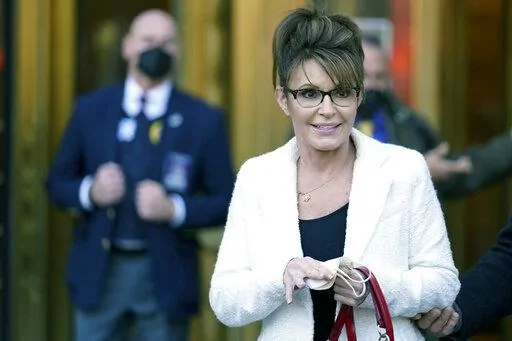 FILE -Sarah Palin leaves the courthouse in New York, Thursday, Feb. 10, 2022. Sarah Palin on Friday, April 1, 2022 shook up an already unpredictable race for Alaska's lone U.S. House seat, filing paperwork to join a field of at least 40 candidates seeking to fill the seat that had been held for 49 years by the late-U.S. Rep. Don Young, who died last month. (AP Photo/Seth Wenig, File)