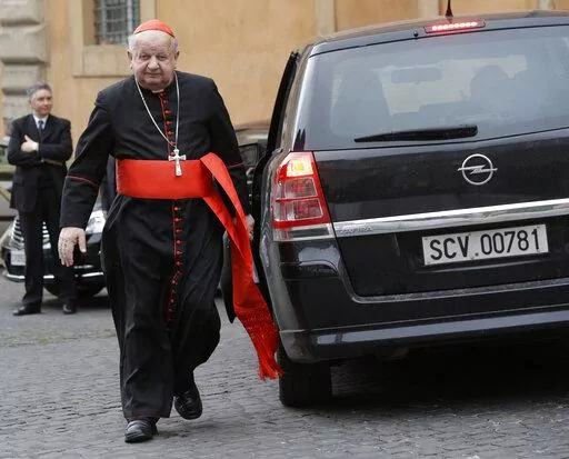 Cardinal Stanislaw Dziwisz arrives for a meeting at the Vatican, Friday, March 8, 2013. A Vatican investigation into allegations that Dziwisz, the former top aide to St. John Paul II was negligent in handling sex abuse claims in his native Poland has cleared him of wrongdoing, the Vatican’s embassy in Poland said Friday, April 22, 2022. (AP Photo/Alessandra Tarantino, File)
