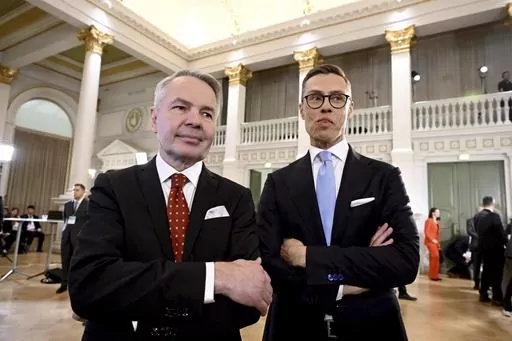 Leaders after the early vote results, National Coalition Party candidate Alexander Stubb, right, and Social Movement candidate Pekka Haavisto stand during the Presidential election event, at the Helsinki City Hall, in Helsinki, Finland, Sunday, Jan. 28, 2024. Finns on Sunday, Feb. 11, 2024 will pick a new head of state from the array of two experienced politicians whose main will be to steer the Nordic country’s foreign and security policy at an unprecedented time when the country is now a NAT