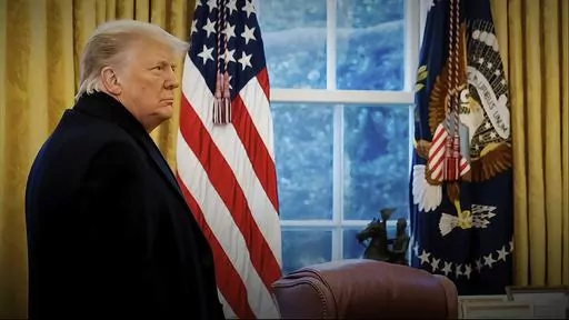 This exhibit from video released by the House Select Committee, shows a photo of President Donald Trump with his coat on as he returns to the Oval Office of the White House in Washington, after speaking on the Ellipse on Jan. 6, 2021. Former President Donald Trump repeatedly declined in an interview aired Sunday, Sept. 17, 2023, to answer questions about whether he watched the Capitol riot unfold on television, saying he would “tell people later at an appropriate time.” (House Select Committ