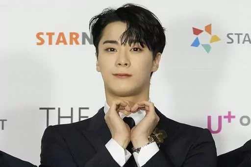 Moon Bin, a member of K-Pop group ASTRO, poses for photos on the red carpet for the 2021 Asia Artist Awards in Seoul, South Korea, Dec. 2, 2021. Moon Bin was found dead at his home in Seoul, his management agency said Thursday, April 20, 2023. (AP Photo/Lee Jin-man, File)