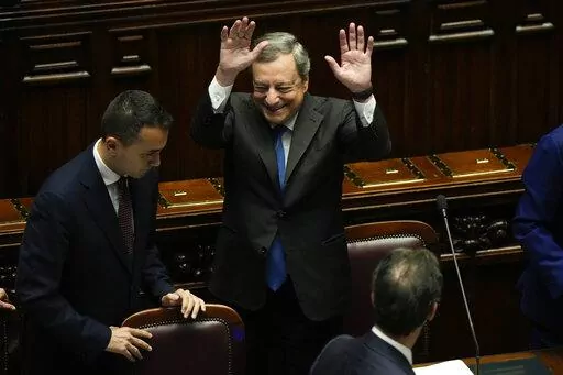 Italian Premier Mario Draghi waves to lawmakers at the end of his address at the Parliament in Rome, Thursday, July 21, 2022. Premier Mario Draghi's national unity government headed for collapse Thursday after key coalition allies boycotted a confidence vote, signaling the likelihood of early elections and a renewed period of uncertainty for Italy and Europe at a critical time. (AP Photo/Andrew Medichini)