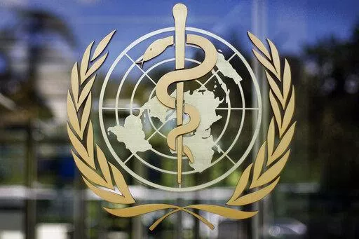 The logo of the World Health Organization is seen at the WHO headquarters in Geneva, Switzerland, June 11, 2009. The World Health Organization chief on Tuesday, Feb. 1, 2022 says 90 million cases of coronavirus have been reported since the omicron variant was first identified 10 weeks ago, amounting to more than in all of 2020, the first year of the COVID-19 pandemic. (AP Photo/Anja Niedringhaus, File)