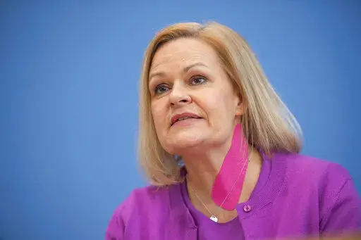 Nancy Faeser, Federal Minister of the Interior and Home Affairs, speaks at a press conference to present the Action Plan on Right-Wing Extremism in Berlin, Germany, Tuesday, March 15, 2022. Germany's top security officials announced a ten-point plan Tuesday to combat far-right extremism in the country that includes disarming some 1,500 suspected extremists and tightening background checks for those wanting to acquire guns. Interior Minister Nancy Faeser said the far right poses the biggest extre