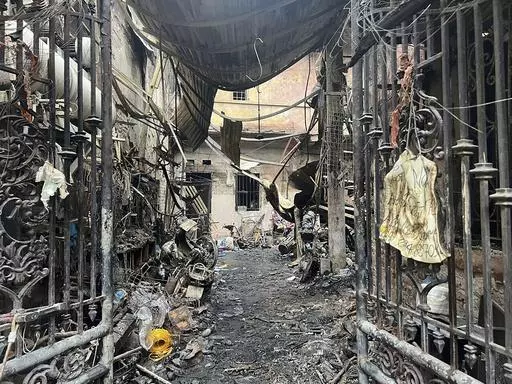 This photo shows the aftermath of a fire at a house in Hanoi, Vietnam Friday, May 24, 2024. Authorities said the fire has killed a number of people and injured a few others. (Phan Nhat Anh/VNA via AP)