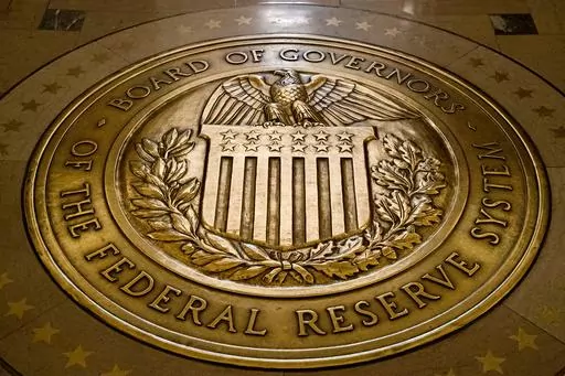 The seal of the Board of Governors of the United States Federal Reserve System is displayed in the ground at the Marriner S. Eccles Federal Reserve Board Building in Washington, Feb. 5, 2018. On Friday, April 14, 2023, The Associated Press reported on stories circulating online incorrectly claiming that a new Federal Reserve digital app, FedNow, will eliminate physical cash. (AP Photo/Andrew Harnik, File)