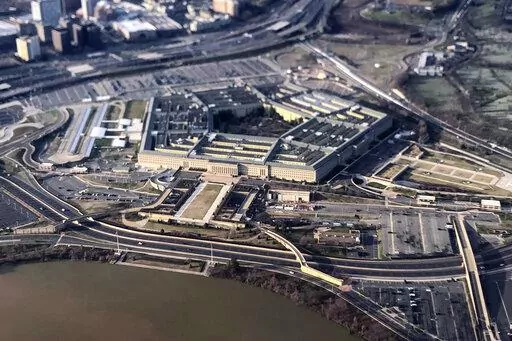 The Pentagon is seen in this aerial view made through an airplane window in Washington, Jan. 26, 2020. Reports of sexual assaults across the U.S. military jumped by 13% last year, driven by significant increases in the Army and the Navy as bases began to move out of pandemic restrictions and public venues opened back up. (AP Photo/Pablo Martinez Monsivais, File)