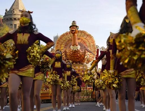 The Tom Turkey float waits along Central Park West before the start of the Macy's Thanksgiving Day Parade, in New York on Nov. 25, 2021. This year’s parade will feature 16 giant character balloons, 28 floats, 40 novelty and heritage inflatables, more than 800 clowns, 12 marching bands, 700 clowns and 10 performance groups.  (AP Photo/Seth Wenig, File)