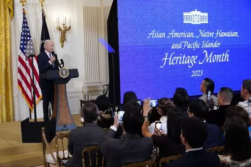 President Joe Biden speaks before a screening of the series "American Born Chinese" in the East Room of the White House in Washington, in celebration of Asian American, Native Hawaiian, and Pacific Islander Heritage Month, May 8, 2023. It has been almost 50 years since the U.S. government established that Asian Americans, Native Hawaiians and Pacific Islanders and their accomplishments should be recognized annually across the nation. (AP Photo/Susan Walsh, File)