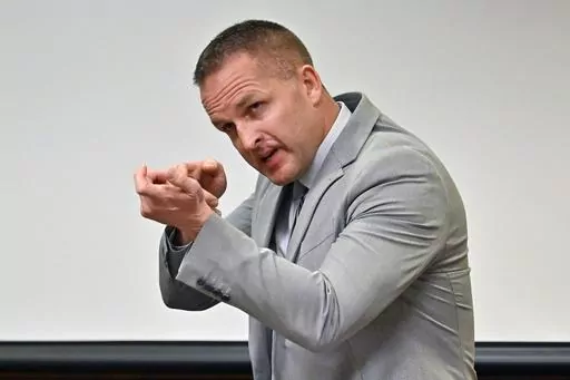 Former Louisville Police officer Brett Hankison describes what he saw in the apartment of Breonna Taylor during testimony, March 2, 2022, in Louisville, Ky. A federal judge on Thursday, Nov. 16, 2023 declared a mistrial in the trial of the former Louisville police officer who fired stray bullets in the deadly Breonna Taylor raid. Hankison was charged with using excessive force that violated the rights of Taylor, her boyfriend and her next-door neighbors. The 12-member jury struggled over several