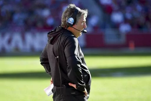 Mississippi State coach Mike Leach on the sidelines against Arkansas during an NCAA college football game Saturday, Nov. 6, 2021, in Fayetteville, Ark. Leach has signed a two-year contract extension through 2025 after leading the Bulldogs to their second consecutive bowl appearance, as confirmed by an MSU official on Wednesday, June 29, 2022. The third-year coach’s annual base salary increases from $5 million to $5.5 million. (AP Photo/Michael Woods, File)