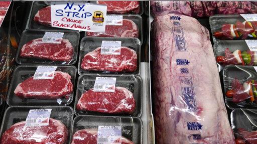 In this Tuesday, June 15, 2021 photograph, beef is displayed in the meat department at Lambert's Rainbow Market, in Westwood, Mass. The rise in consumer prices, or inflation, is a slow erosion of your money over time. And supply chain issues are a part of the inflation equation too. How can you protect yourself? Small financial moves can make a difference in helping to preserve your spending power. (AP Photo/Charles Krupa)