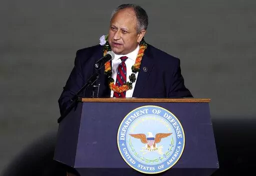 Navy Secretary Carlos Del Toro speaks at the 80th Pearl Harbor Anniversary ceremony at Joint Base Pearl Harbor-Hickam, Tuesday, Dec. 7, 2021, in Honolulu. Del Toro announced Thursday, May 19, 2022, that a future destroyer will be named USS Telesforo Trinidad in honor of a Filipino sailor who rescued two crew members when their ship caught fire more than a century ago. (AP Photo/Marco Garcia,File)