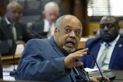 Mississippi Rep. Earle Banks, D-Jackson, asks a question at the state Capitol, Oct. 18, 2022, in Jackson, Miss. A federal judge sentenced Banks to two years of probation Monday, Nov. 27, 2023, months after the longtime lawmaker pleaded guilty to making a false statement on a tax return for failing to report more than $500,000 of income from the sale of real estate in 2018. Banks had already paid nearly $85,000 in restitution. His attorney said Banks intends to remain in the Legislature. (AP Phot