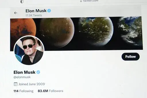 Part of the Twitter page of Elon Musk is seen on the screen of a computer in Sausalito, Calif., on Monday, April 25, 2022. The Tesla CEO gave the strongest hint yet Monday, May 16, 2022, that he would like to pay less for Twitter than his $44 billion offer made the previous month. (AP Photo/Eric Risberg, File)