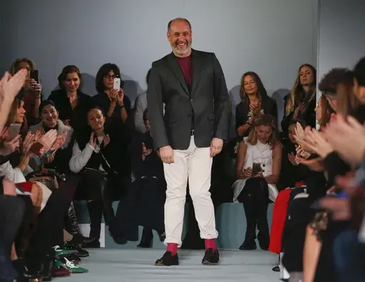 Peter Copping steps out to applause from the audience after the modeling of the Oscar de la Renta Fall 2016 collection during Fashion Week in New York, Feb. 16, 2016. Lanvin, the world's longest continually-running couture house, named Peter Copping on Thursday June27, 2024 as its new artistic director. Founded in 1889 by Jeanne Lanvin and based in Paris, Lanvin will welcome Copping as the creative head of its women's and men's collections starting in fall. (AP Photo/Julie Jacobson, File)