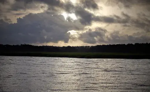 The sun rises over Sapelo Island, Ga., a Gullah-Geechee community, on June 10, 2013. (AP Photo/David Goldman, File)