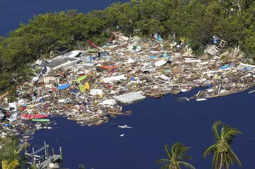 Debris is piled up at the end of a cove following heavy winds and storm surge caused by Hurricane Ian, Sept. 29, 2022, in Barefoot Beach, Fla. Florida has seen an increase in cases of flesh-eating bacteria this year driven largely by a surge in the county hit hardest by Hurricane Ian. The state Department of Health reports that as of Friday there have been 65 cases of vibrio vulnificus infections and 11 deaths in Florida this year. That compares to 34 cases and 10 deaths reported during all of 2