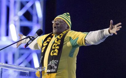 FILE - Retired Anglican Archbishop Desmond Tutu of South Africa gestures during the opening concert for the soccer World Cup at Orlando stadium in Soweto, South Africa, Thursday, June 10, 2010. Tutu, South Africa’s Nobel Peace Prize-winning activist for racial justice and LGBT rights and retired Anglican Archbishop of Cape Town, has died, South African President Cyril Ramaphosa announced Sunday, Dec. 26, 2021. He was 90. (AP Photo/Hassan Ammar, File)