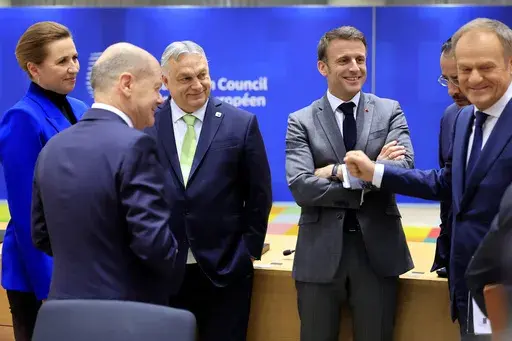 From left, Denmark's Prime Minister Mette Frederiksen, Germany's Chancellor Olaf Scholz, Hungary's Prime Minister Viktor Orban, French President Emmanuel Macron and Poland's Prime Minister Donald Tusk during a round table meeting at an EU Summit in Brussels, Thursday, March 21, 2024. European Union leaders are gathering to consider new ways to help boost arms and ammunition production for Ukraine. Leaders will also discuss in Thursday's summit the war in Gaza amid deep concern about Israeli plan
