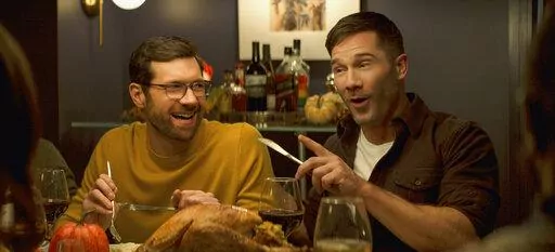 This image released by Universal Pictures shows Billy Eichner, left, and Luke Macfarlane in a scene from "Bros." (Universal Pictures via AP)