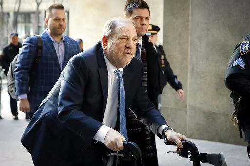 Harvey Weinstein arrives at a Manhattan courthouse as jury deliberations continue in his rape trial in New York, on Feb. 24, 2020. On Monday, Dec. 19, 2022, Weinstein was found guilty of rape at a Los Angeles trial in another #MeToo moment of reckoning, five years after he became a magnet for the movement. (AP Photo/John Minchillo, File)