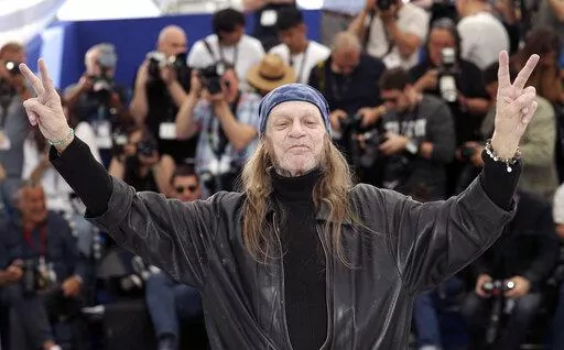 Actor Leon Vitali poses for photographers at the photo call for the film 'The Shining' at the 72nd international film festival, Cannes, southern France, May 16, 2019. Vitali, the “Barry Lyndon” actor who became one of Stanley Kubrick’s closest associates, has died. He was 74. Vitali died Friday in Los Angeles, his family told The Associated Press Sunday, Aug. 21, 2022. (AP Photo/Petros Giannakouris)
