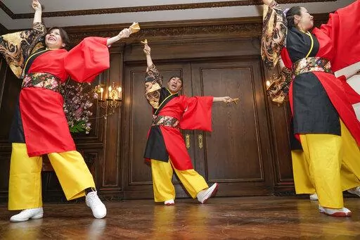 Kazanami Yosakoi Dance Project performs during a news conference in New York, Wednesday, April 27, 2022. Performers and Japanese officials were promoting the first ever Japan Parade, celebrating Japanese culture and tradition, which will take place in New York on Saturday, May 14, 2022. (AP Photo/Seth Wenig)