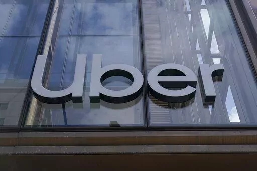 An Uber sign is displayed at the company's headquarters in San Francisco, Monday, Sept. 12, 2022. Uber said Thursday, Sept. 15, that it reached out to law enforcement after a hacker apparently breached its network. A security engineer said the intruder provided evidence of obtaining access to crucial systems at the ride-hailing service. (AP Photo/Jeff Chiu, File)