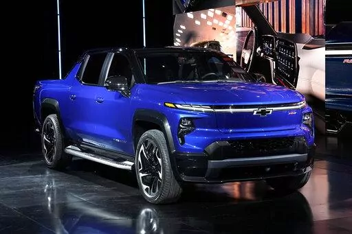 The 2024 Chevrolet Silverado EV RST is shown in Detroit, Wednesday, Jan. 5, 2022.  General Motors expects its portfolio of electric vehicles to turn a profit in North America by 2025. That will come as it boosts battery and assembly plant capacity to build over 1 million EVs per year.  (AP Photo/Paul Sancya, File)