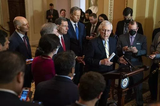Senate Minority Leader Mitch McConnell of Ky., talks with reporters after a policy luncheon, Tuesday, April 5, 2022, at the Capitol in Washington. (AP Photo/Evan Vucci)