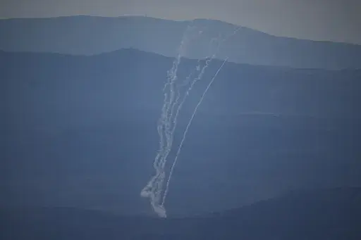 Israeli Iron Dome air defense system fires to intercept rockets that were launched from Lebanon, in northern Israel, Saturday, Sept. 21, 2024. (AP Photo/Leo Correa)