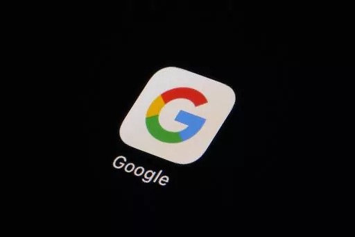 The Google app icon is seen on a smartphone, Tuesday, Feb. 28, 2023, in Marple Township, Pa. Google, on Thursday, Sept. 7, will soon require political advertising that incorporates artificial intelligence come with a prominent disclosure that the technology is being used to depict real or realistic-looking people or events. The use of AI has already begun to seep into that space and last month Federal Election Committee said that it may soon regulate AI-generated deepfakes in political ads ahead