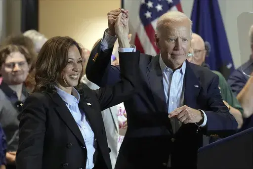 Democratic presidential nominee Vice President Kamala Harris, left, and President Joe Biden attend a campaign event at the IBEW Local Union #5 union hall in Pittsburgh, on Labor Day, Sept. 2, 2024. (AP Photo/Jacquelyn Martin, File)