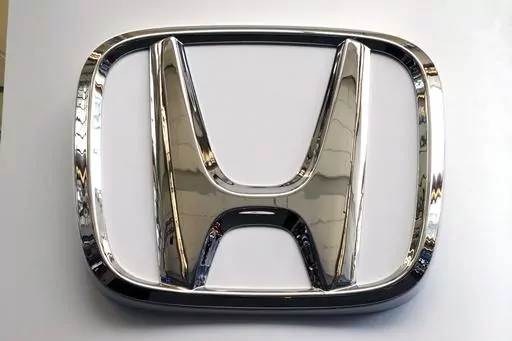 FILE- This Feb. 14, 2019 file photo shows a Honda logo at the 2019 Pittsburgh International Auto Show in Pittsburgh. Honda is recalling a half-million vehicles in the U.S. and Canada, Wednesday, March 15, 2023, because the front seat belts may not latch properly. The recall covers some of the the automaker’s top-selling models including the 2017 through 2020 CR-V, the 2018 and 2019 Accord, the 2018 through 2020 Odyssey and the 2019 Insight. Also included is the Acura RDX from the 2019 and 2020